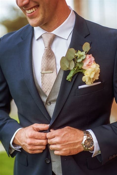 dark grey suit with champagne tie